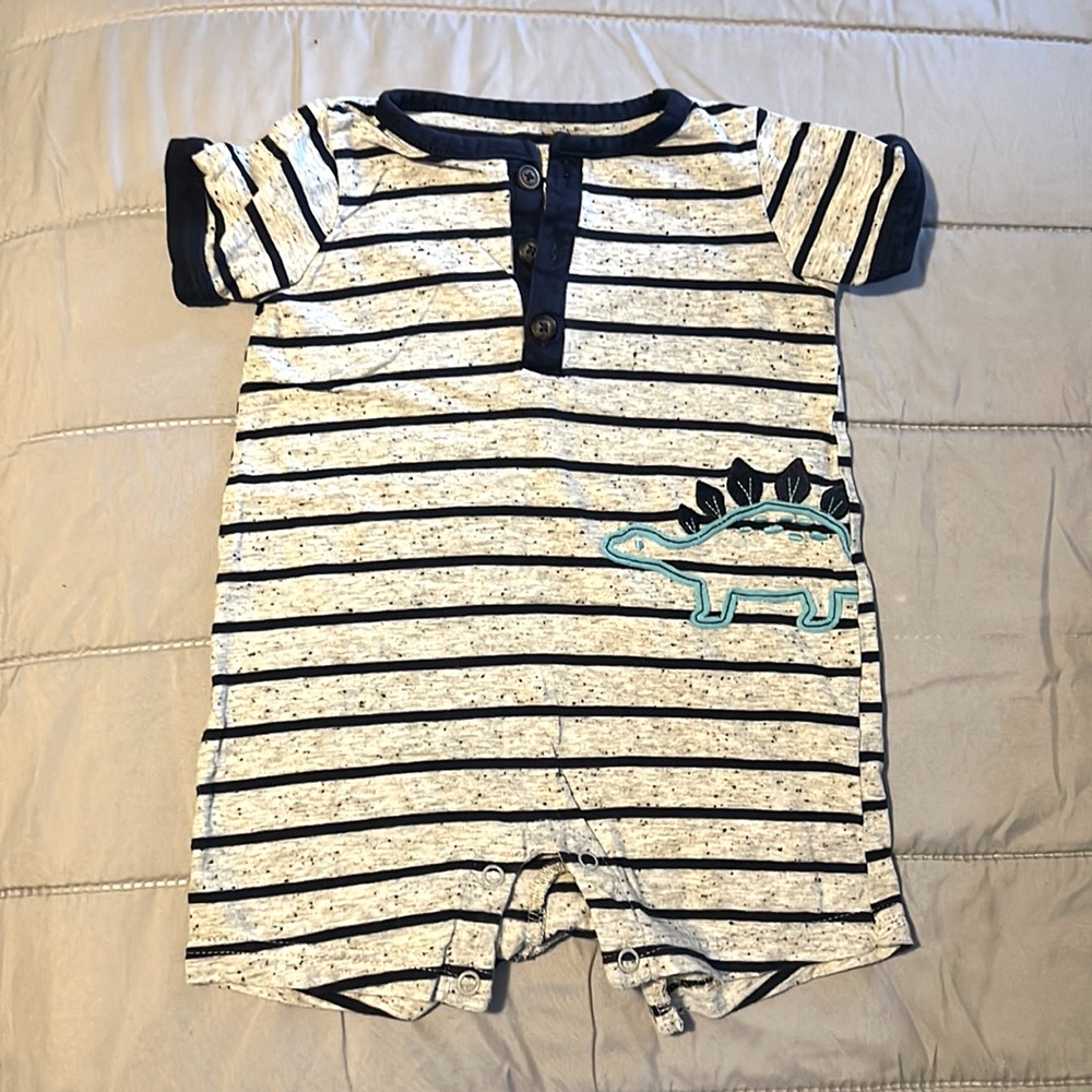 Baby boy onesie good condition. Has a small dinosaur on the right side.